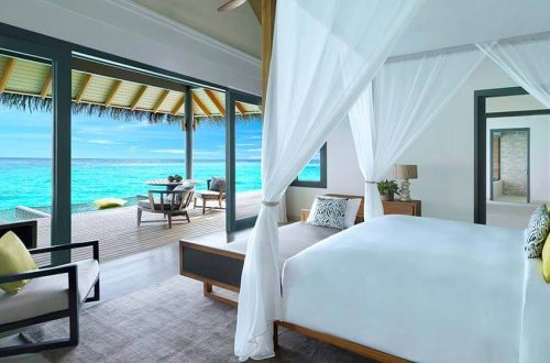 Villas sur pilotis avec hamacs aux Maldives